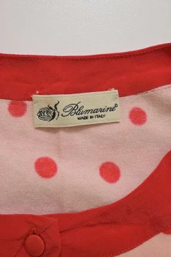 Red rayon-blend polka dot print jersey knit button-front cardigan
