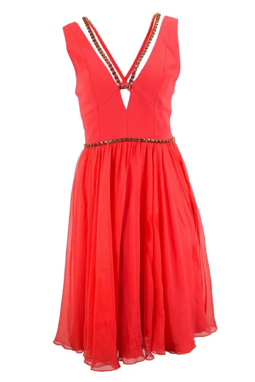 Red sleeveless open neck mini flare dress with crystals embellished on the waist and neckline.