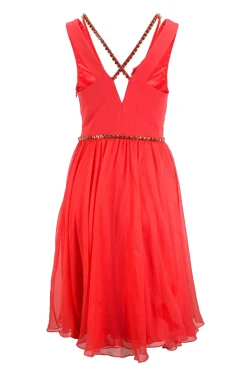 Red sleeveless open neck mini flare dress with crystals embellished on the waist and neckline.
