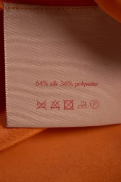 Roksanda round neck long sleeve tangerine top in silk with elasticad cuffs