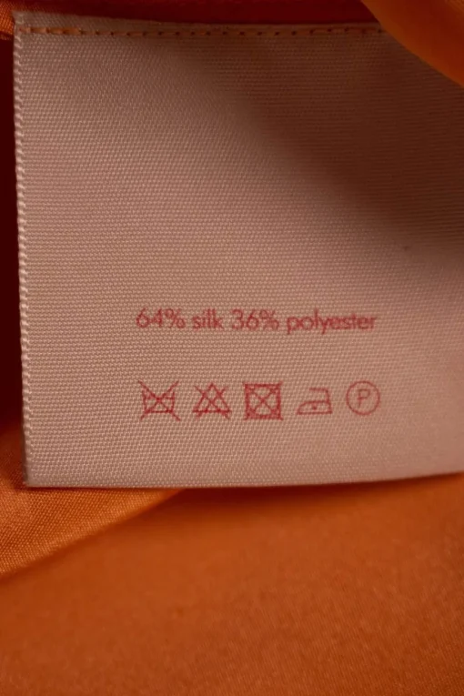 Roksanda round neck long sleeve tangerine top in silk with elasticad cuffs