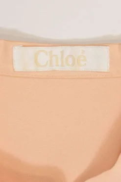 Sahara Pink silk georgette band collar blouse featuring lace detailing along sleeves
