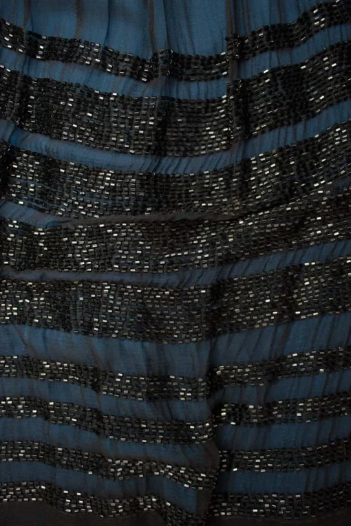 Silk black with blue inner strap knee-length dress adorned with shimmery beads