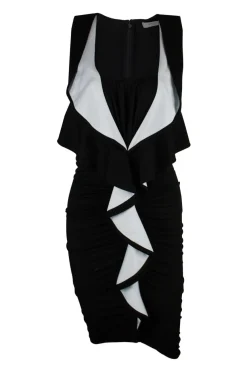 Sleeveless black dress with white ruffles