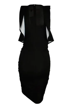 Sleeveless black dress with white ruffles