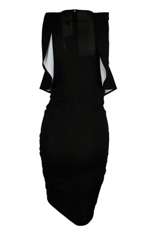 Sleeveless black dress with white ruffles