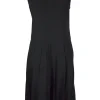 Sleeveless dress with asymetrical skirt and leather trim
