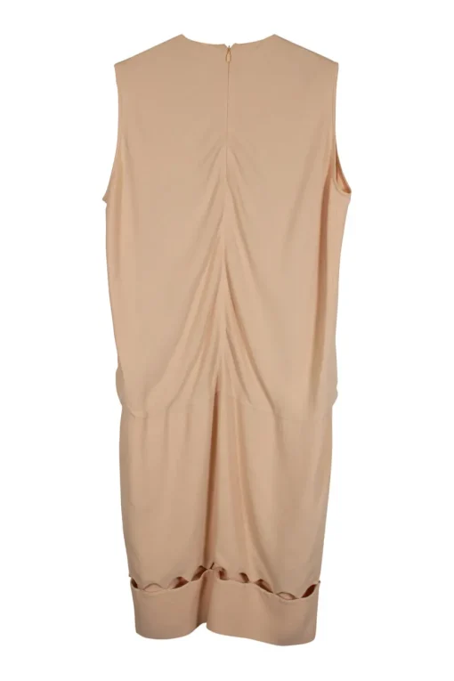 Sleeveless round neck shift midi dress with dropped waist and cut out pattern around hem