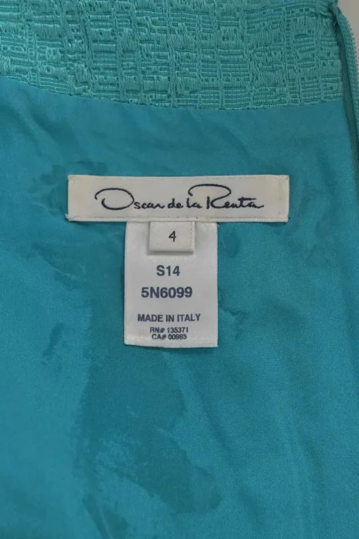 Teal cotton-blend bouclé tweed wrap-effect cap sleeve belted sheath dress with tucked bodice and vented skirt