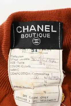 Terracotta cashmere interlock jersey knit funnel neck half-button pullover sweater with Coco Mark shank buttons