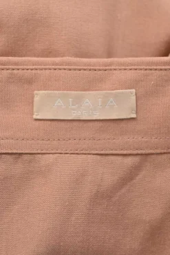 Terracotta cotton-blend point collar button-front peplum blouse with drawstring waist and tiered laser-cut plissé hem