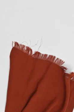 Terracotta triacetate button-loop tie-back midi sun dress with fringe hem