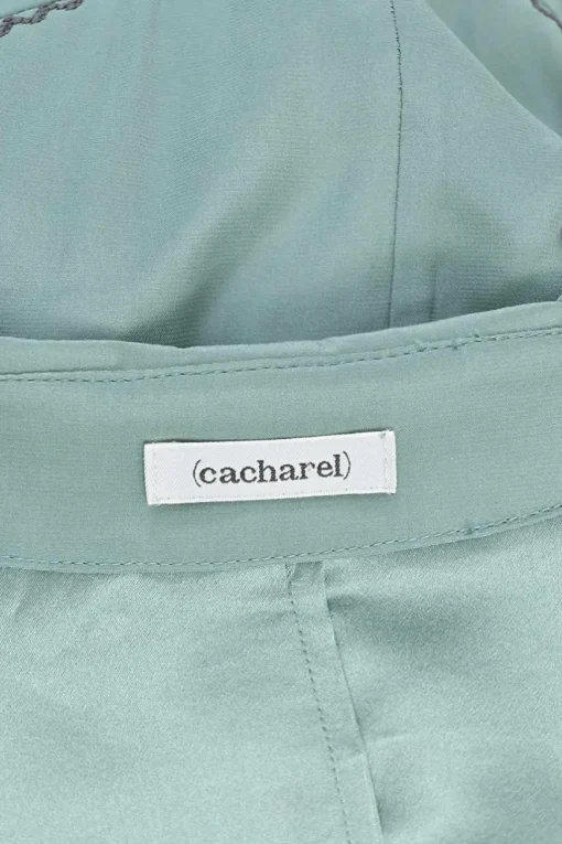 Turquoise silk symmetrical geometric pattern spread collar v-neck long sleeve gathered button cuff blouse with side concealed zipper