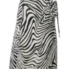 Two-tone abstract zebra jacquard wrap-front apron-style midi skirt with self-tie hip fastening