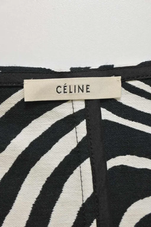 Two-tone abstract zebra jacquard wrap-front apron-style midi skirt with self-tie hip fastening