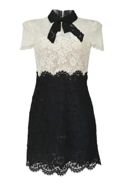 Two-tone cotton-blend paneled eyelash lace tie-neck short sleeve illusion mini dress with scalloped edges