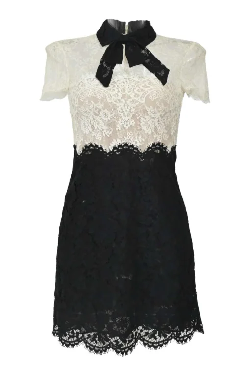 Two-tone cotton-blend paneled eyelash lace tie-neck short sleeve illusion mini dress with scalloped edges