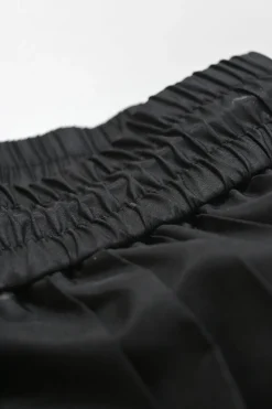 Two-tone polyester plissé midi skirt with toggle waist