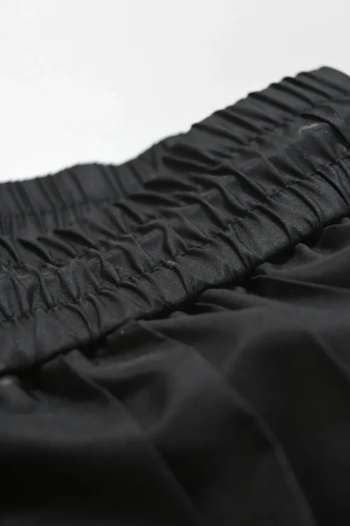 Two-tone polyester plissé midi skirt with toggle waist