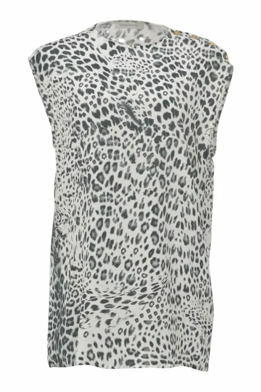 Two-tone silk leopard print cap sleeve blouse with coat of arms shank button appliqué at shoulder line