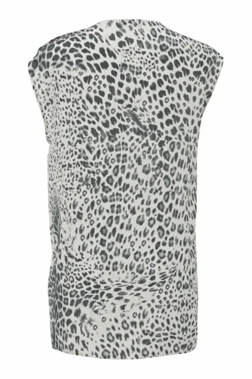 Two-tone silk leopard print cap sleeve blouse with coat of arms shank button appliqué at shoulder line