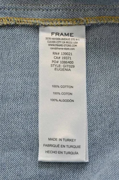 Washed indigo cotton denim ruched sleeve band collar blouse with concealed front fastening