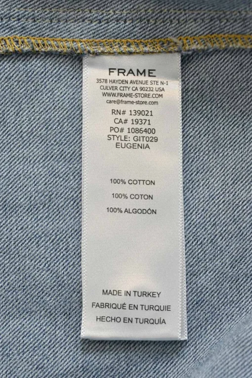 Washed indigo cotton denim ruched sleeve band collar blouse with concealed front fastening