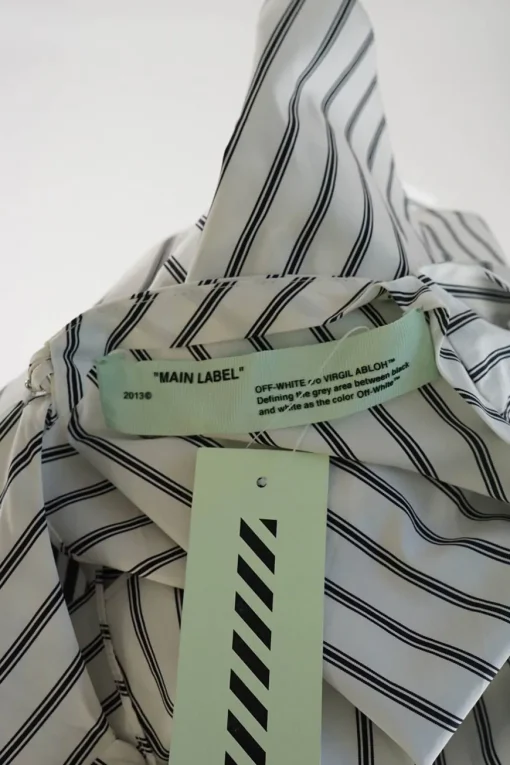 White and dark navy bias-cut striped cotton poplin classic collar sleeveless handkerchief blouse