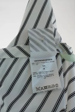 White and dark navy bias-cut striped cotton poplin classic collar sleeveless handkerchief blouse