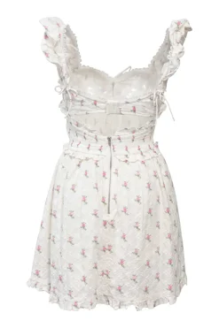 White and pink shirred cotton floral print tie-front bustier skater dress with cutout back and tonal frill trim appliqué