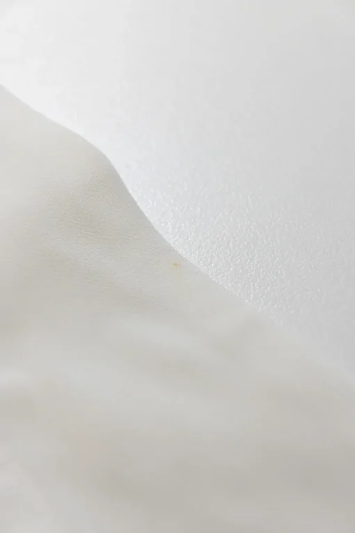White asymmetric ruched spread collar button-front shirt