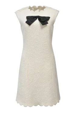 White bow-embellished polyester-wool blend bouclé tweed cap sleeve shift dress with scalloped edges