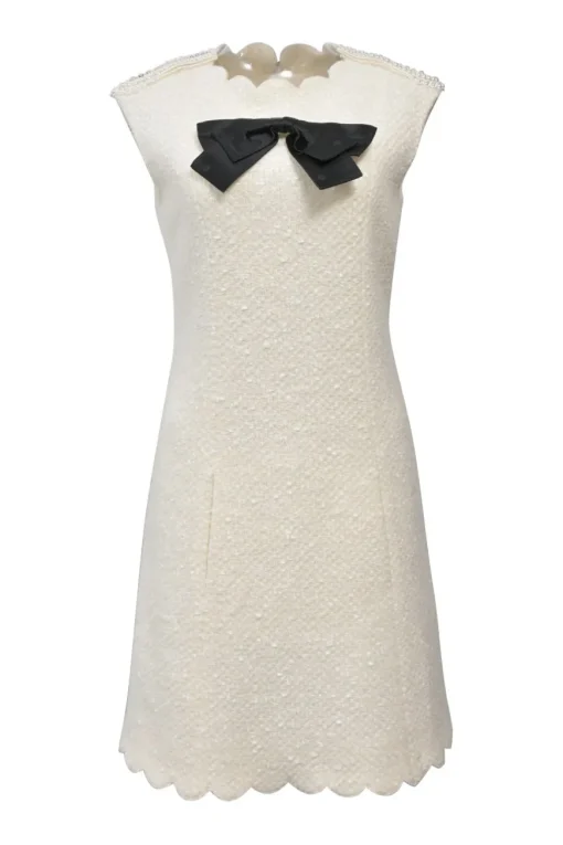 White bow-embellished polyester-wool blend bouclé tweed cap sleeve shift dress with scalloped edges