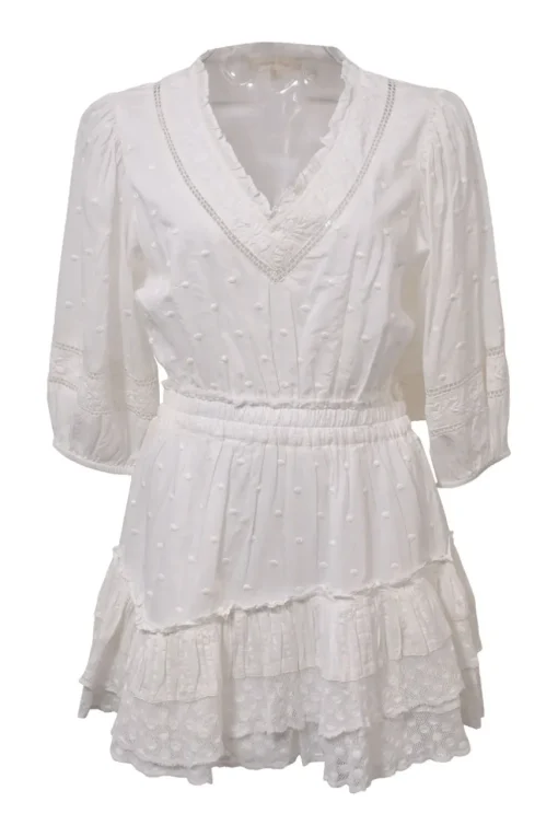 White cotton clip jacquard plunge neck blouson mini dress with cropped sleeves and tier ruffle skirt