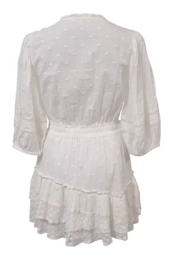 White cotton clip jacquard plunge neck blouson mini dress with cropped sleeves and tier ruffle skirt