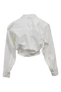 White cotton cropped shawl collar blouse with corset-style boning