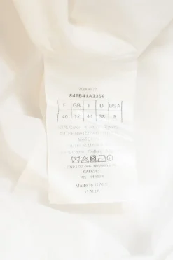 White cotton poplin crewneck sleeveless shirt with piqué plastron bib