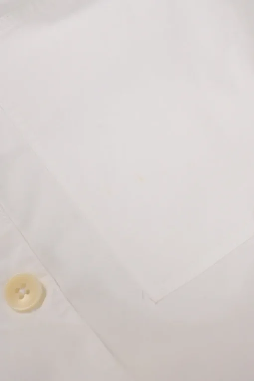 White cotton poplin foldover cold-shoulder button-front shirt