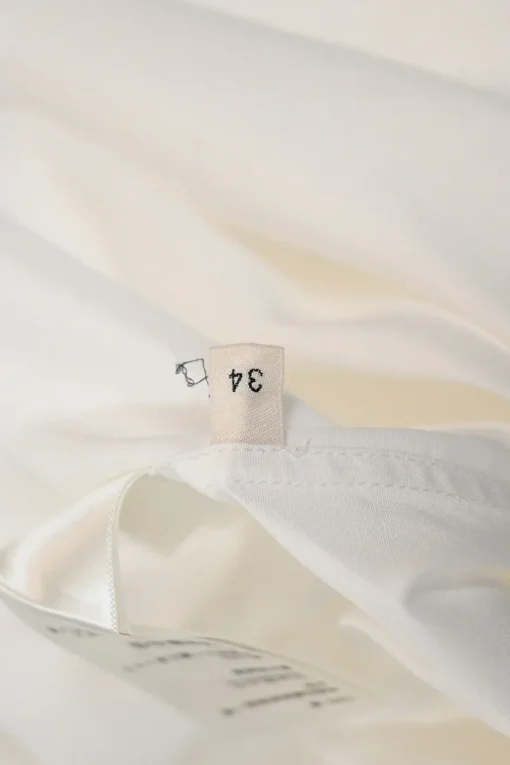 White cotton poplin frill-trimmed high-collar button-front shirt