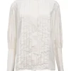 White cotton poplin high-collar button-front shirt featuring pintuck bib and gathered bishop sleeves