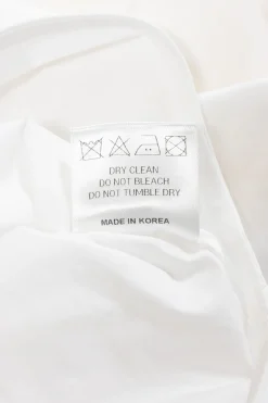 White cotton poplin point collar button-front cropped shirt
