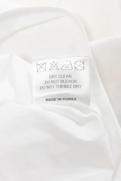 White cotton poplin point collar button-front cropped shirt