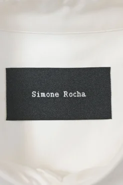 White cotton poplin point collar button-front shirt featuring tonal scalloped broderie trim inserts