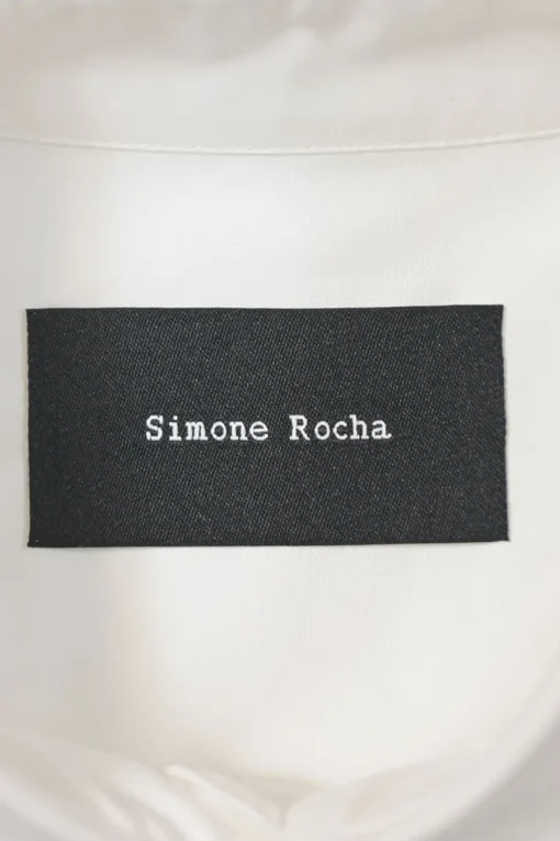 White cotton poplin point collar button-front shirt featuring tonal scalloped broderie trim inserts