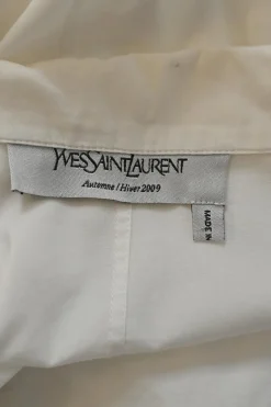 White cotton poplin single breasted notch lapel plunge neck blouse with flutter sleeve appliqué