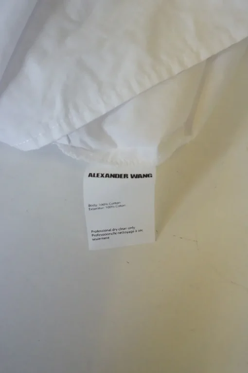 White cotton poplin sleeveless pleated shirt