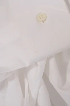 White cotton poplin spread collar button-front shirt