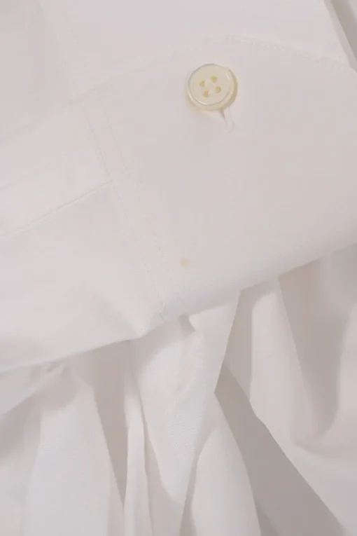 White cotton poplin spread collar button-front shirt