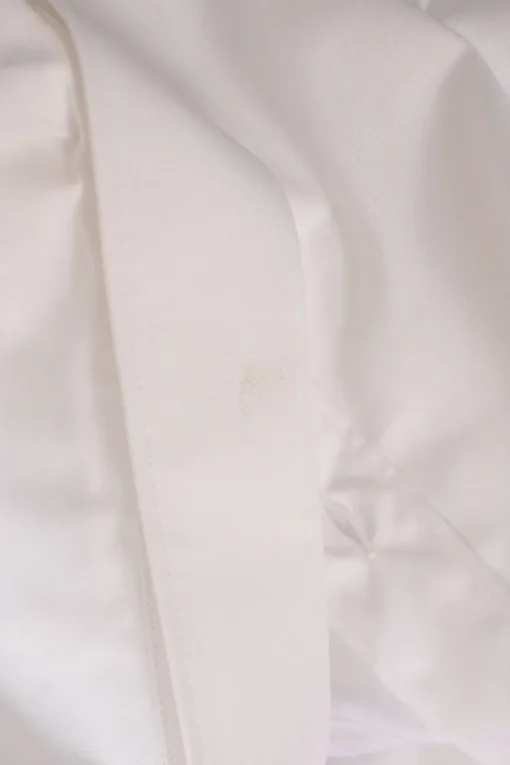 White cotton poplin spread collar button-front shirt