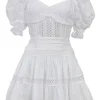 White cotton-blend peek-a-boo puff-sleeve mini bustier dress with Rouleaux trim appliqué